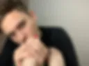 Boy licks feet