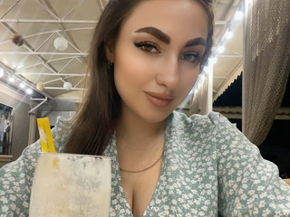 With a cocktail 🍹