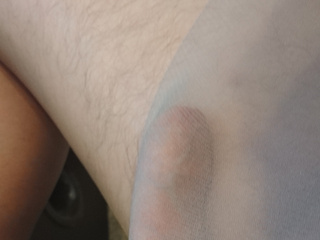 My stiff Cock under grey Nylontights.