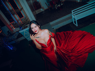 Wearing red gown