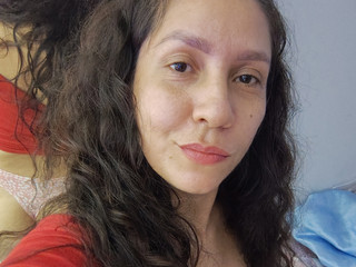 My curly hair, natural like the rest of my body.