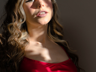 Aurora in mini red dress