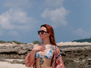 Nika on the beach in a kimono