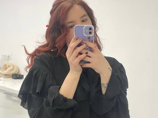 In another black dress