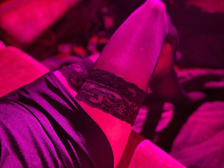 In a dress and stockings