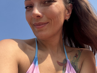 Hot MILF on the Beach