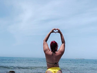 Redhead Charm at the Beach”