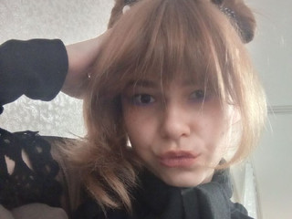 A cute girl with a cute hairstyle