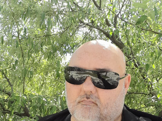 Under the tree with glasses