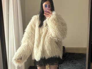 In a fur coat