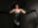 Creative photo shoot in a black dress