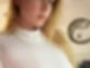 Curvy blonde in White hot bodysuit