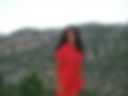 In a red jumpsuit