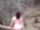Naked in the forest.
