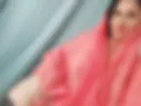 The naked body is covered with a pink robe