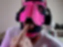 Pink pup sticks his tongue out for you
