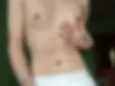 Alex in white pants