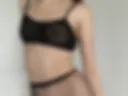 Standing on all fours in fishnet tights