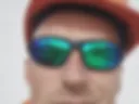 In glasses and helmet.