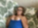 Strict milf in glasses with a book