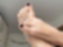 Toes with black polish