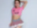 Pink top and a tiny skirt
