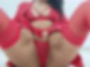 Sexy North in red costume with legs open