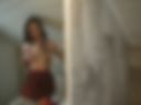 Dressed cam girl in student outfit taking shower