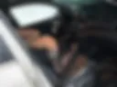 In a car with an OPEN door