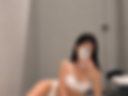 Trying on a white swimsuit