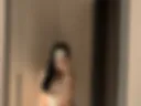 Figure in front of the mirror