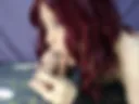 Sucking a dildo close-up