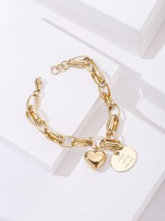 gold bracelet with heart pendant