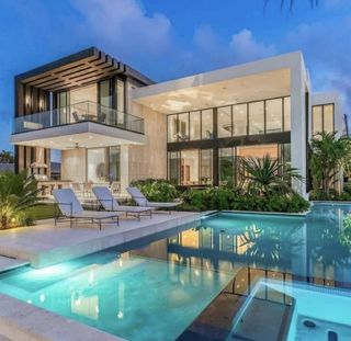 a mansion with a dock