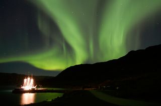 See the dancing lights over Iceland