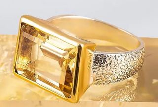 Silver ring with yellow sapphire