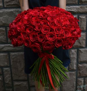 A large bouquet of red roses