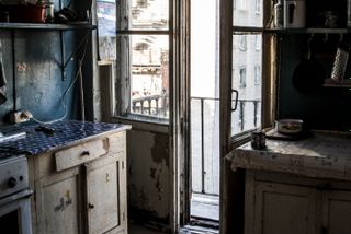 Оплатить долги за квартиру.