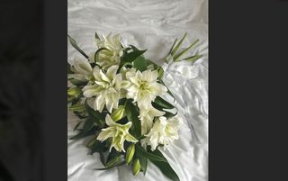 a large bouquet of peony lilies