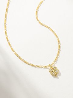 Gold chain with clover pendant