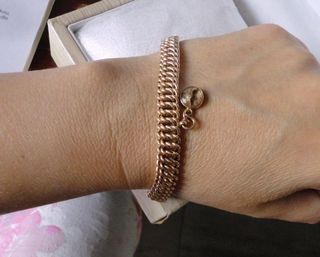 Gold bracelet and earrings