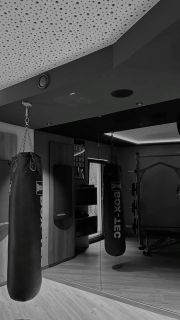own studio with a punching bag