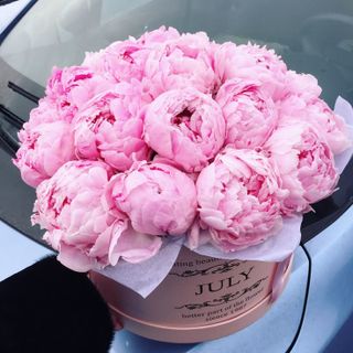 Give a bouquet of peonies