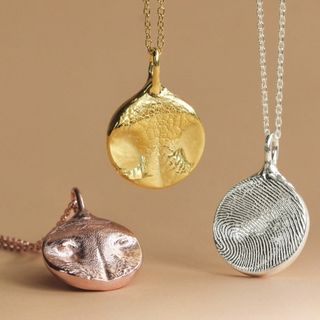 Pendants with the imprint of my cats' noses